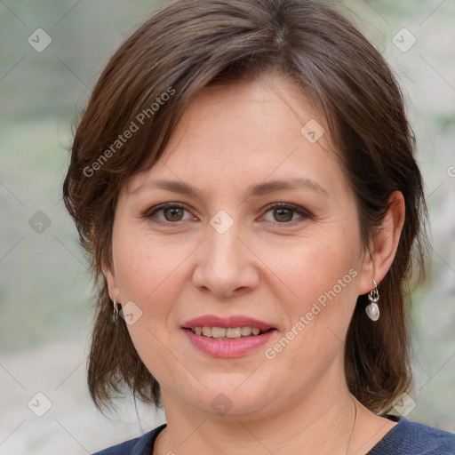 Joyful white young-adult female with medium  brown hair and blue eyes