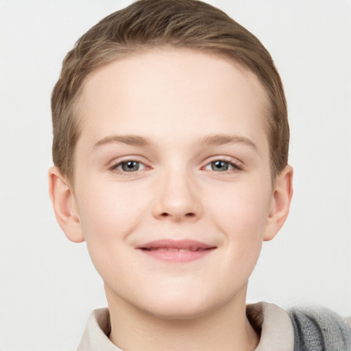 Joyful white child female with short  brown hair and grey eyes