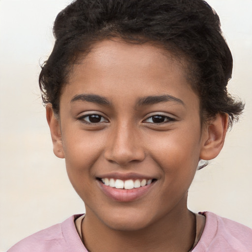 Joyful white child female with short  brown hair and brown eyes