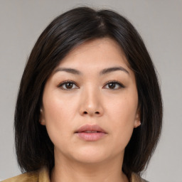 Neutral asian young-adult female with medium  brown hair and brown eyes