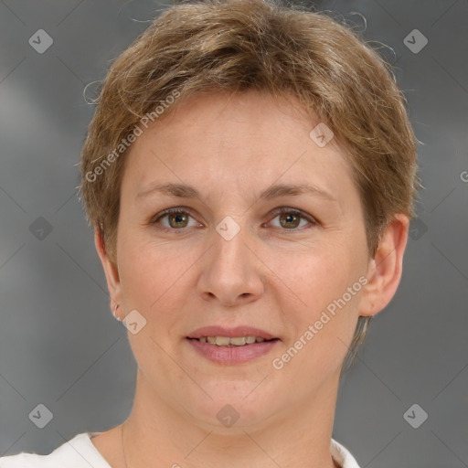 Joyful white adult female with short  brown hair and grey eyes