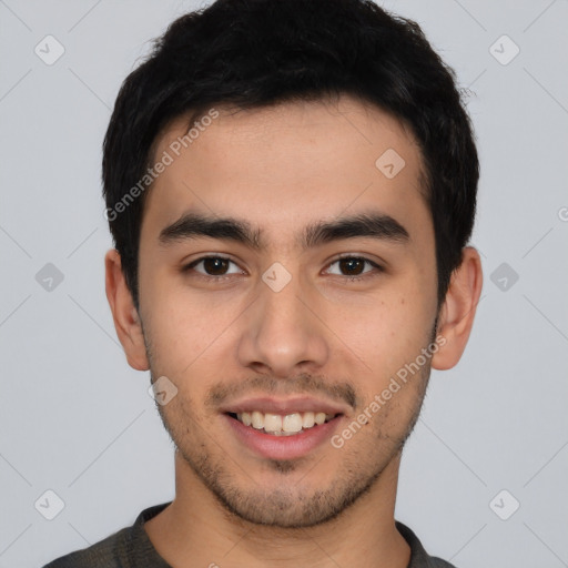 Joyful asian young-adult male with short  brown hair and brown eyes