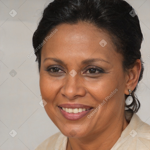 Joyful black adult female with medium  brown hair and brown eyes