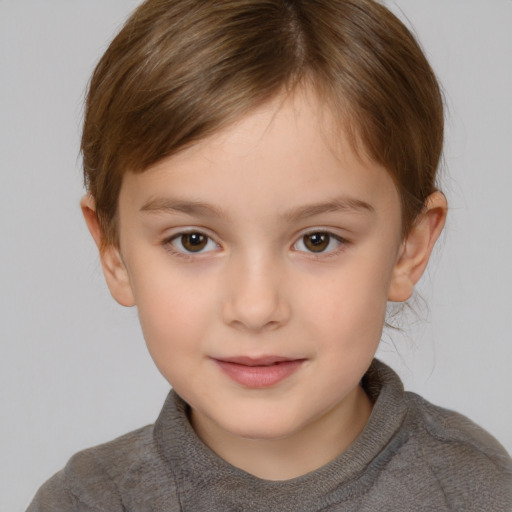 Joyful white child female with short  brown hair and brown eyes