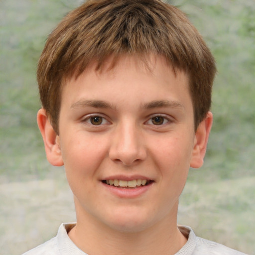 Joyful white child male with short  brown hair and brown eyes