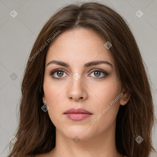 Neutral white young-adult female with long  brown hair and brown eyes