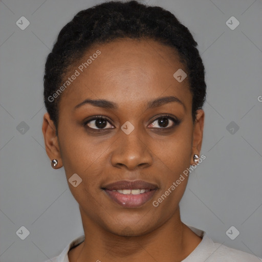 Joyful black young-adult female with short  black hair and brown eyes