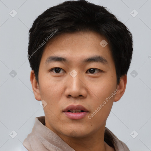 Neutral asian young-adult male with short  black hair and brown eyes