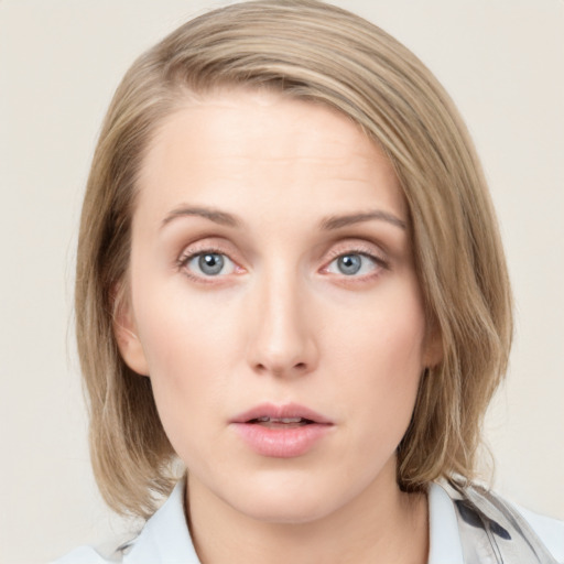 Neutral white young-adult female with medium  brown hair and blue eyes