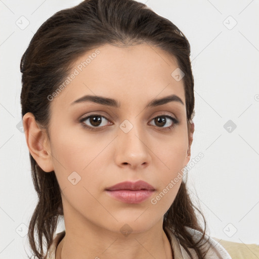 Neutral white young-adult female with long  brown hair and brown eyes