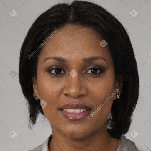 Joyful black young-adult female with medium  brown hair and brown eyes