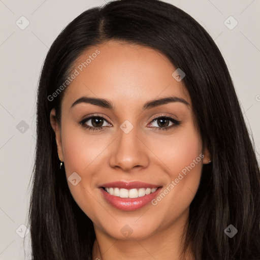 Joyful white young-adult female with long  black hair and brown eyes