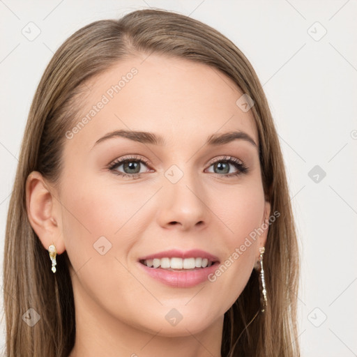 Joyful white young-adult female with long  brown hair and grey eyes