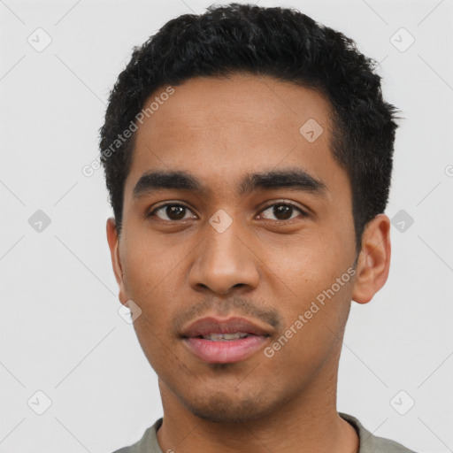 Neutral latino young-adult male with short  black hair and brown eyes