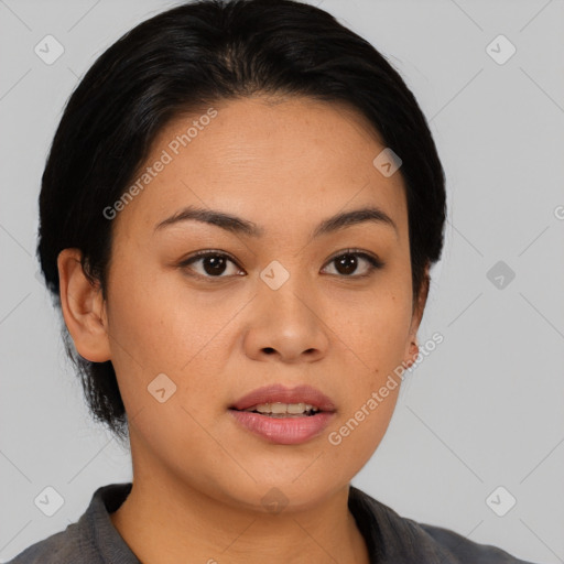 Joyful asian young-adult female with short  black hair and brown eyes