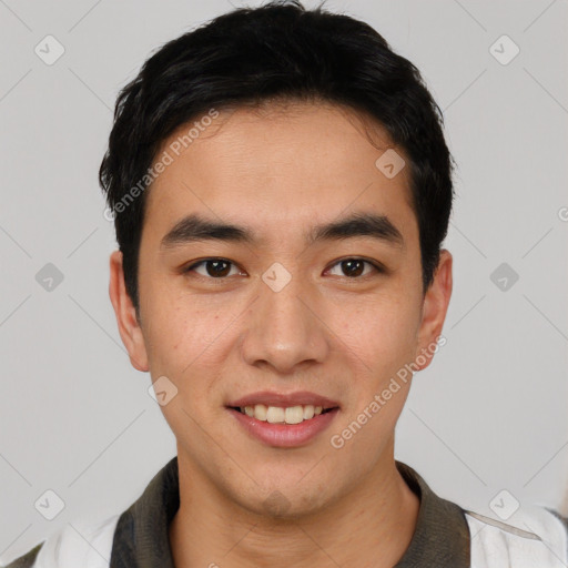 Joyful white young-adult male with short  black hair and brown eyes