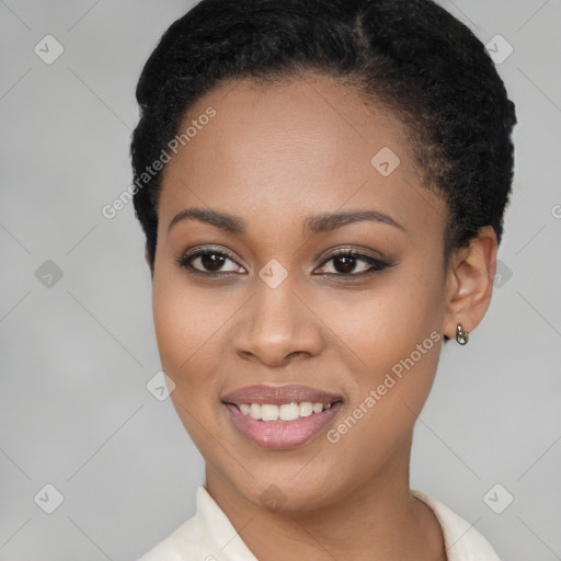 Joyful latino young-adult female with short  brown hair and brown eyes