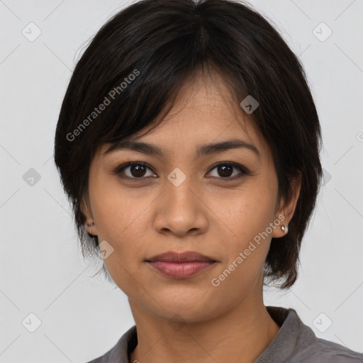 Joyful asian young-adult female with medium  brown hair and brown eyes