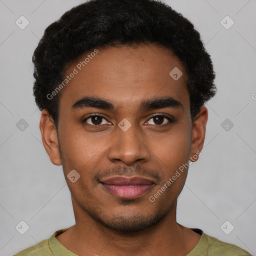 Joyful black young-adult male with short  black hair and brown eyes