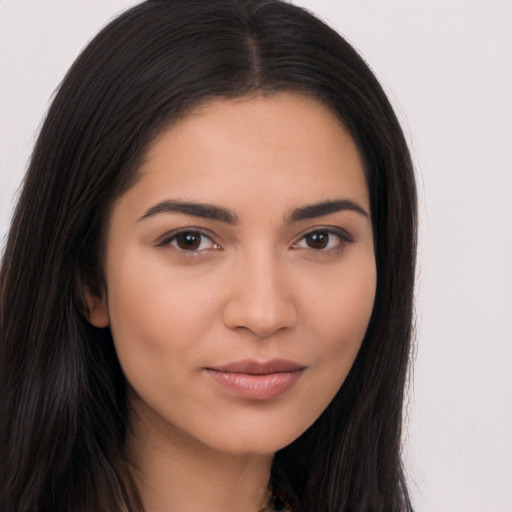 Joyful asian young-adult female with long  brown hair and brown eyes