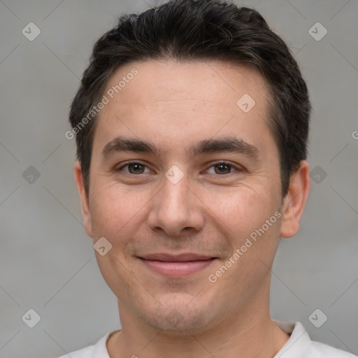 Joyful white young-adult male with short  brown hair and brown eyes