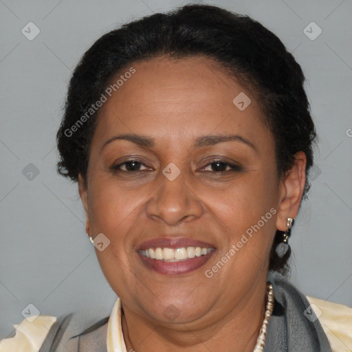 Joyful latino adult female with short  brown hair and brown eyes