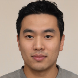 Neutral asian young-adult male with short  black hair and brown eyes