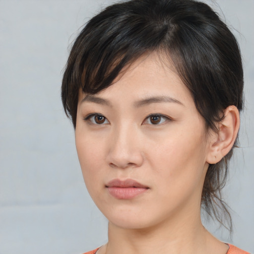 Neutral asian young-adult female with medium  brown hair and brown eyes