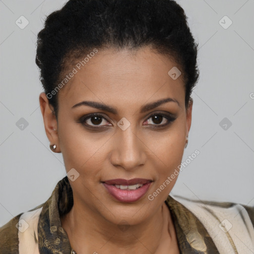 Joyful black young-adult female with short  brown hair and brown eyes