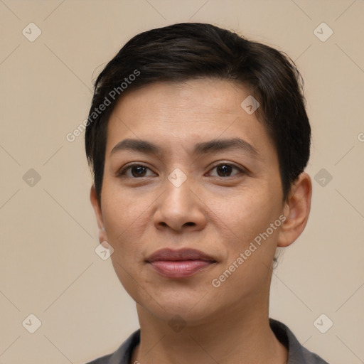 Joyful latino young-adult female with short  brown hair and brown eyes