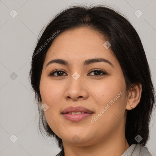 Joyful asian young-adult female with medium  brown hair and brown eyes