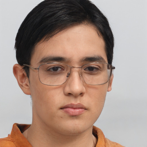 Neutral asian young-adult male with short  brown hair and brown eyes