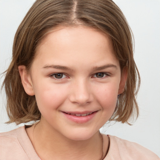 Joyful white child female with medium  brown hair and brown eyes