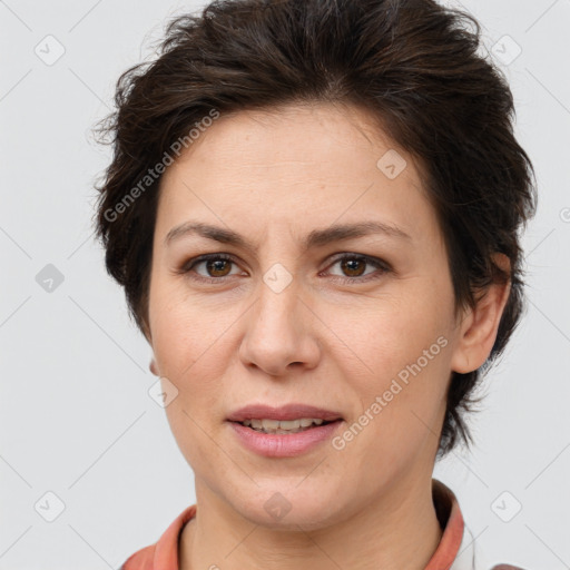 Joyful white adult female with short  brown hair and brown eyes