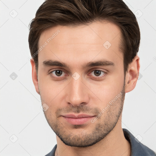 Neutral white young-adult male with short  brown hair and brown eyes