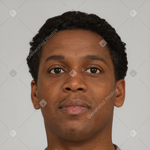 Neutral black young-adult male with short  brown hair and brown eyes