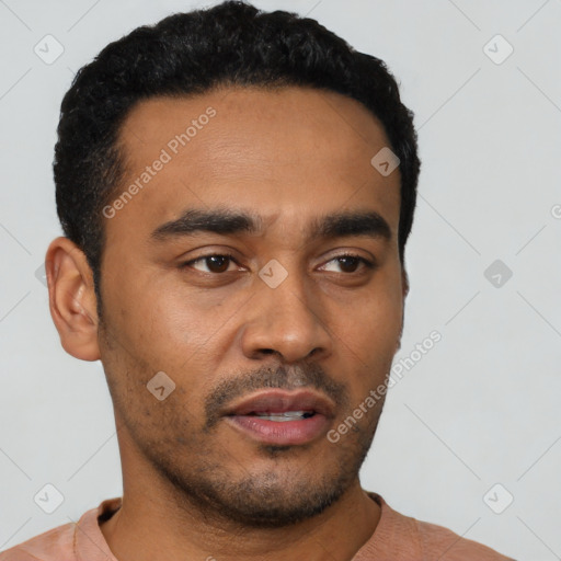Neutral latino young-adult male with short  black hair and brown eyes