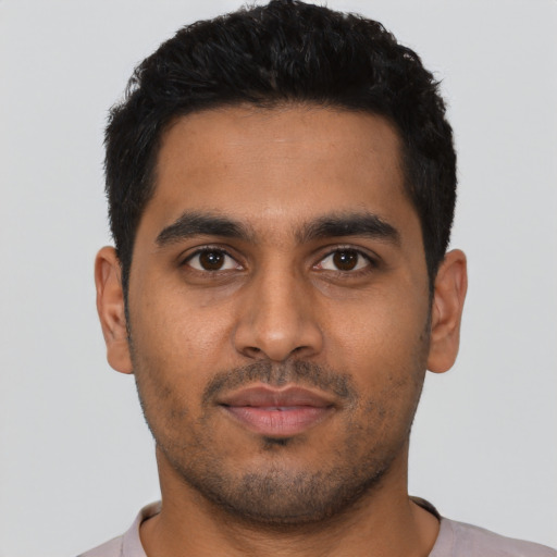 Neutral latino young-adult male with short  black hair and brown eyes