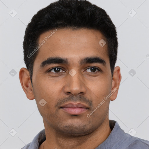 Neutral latino young-adult male with short  black hair and brown eyes