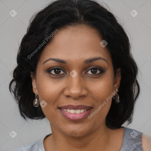 Joyful black young-adult female with medium  brown hair and brown eyes
