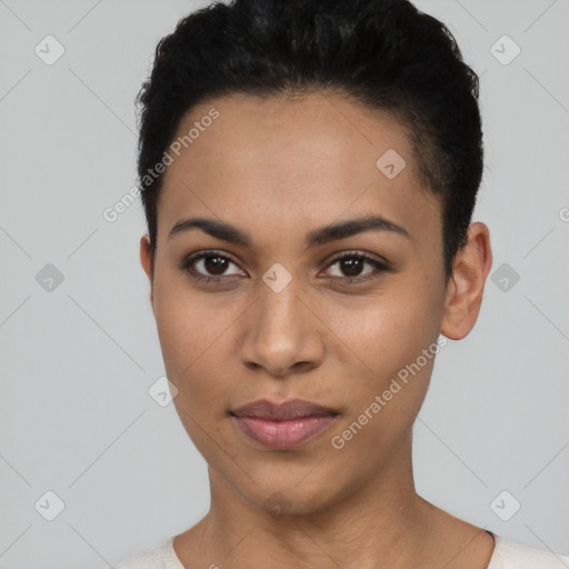 Joyful latino young-adult female with short  black hair and brown eyes