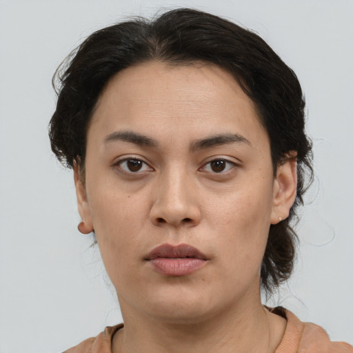 Neutral asian young-adult female with medium  brown hair and brown eyes