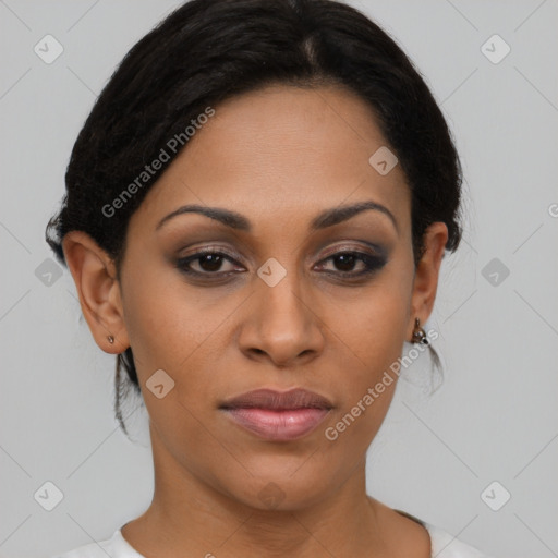 Joyful black young-adult female with medium  brown hair and brown eyes