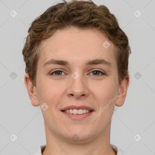 Joyful white young-adult female with short  brown hair and grey eyes