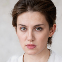 Neutral white young-adult female with medium  brown hair and grey eyes