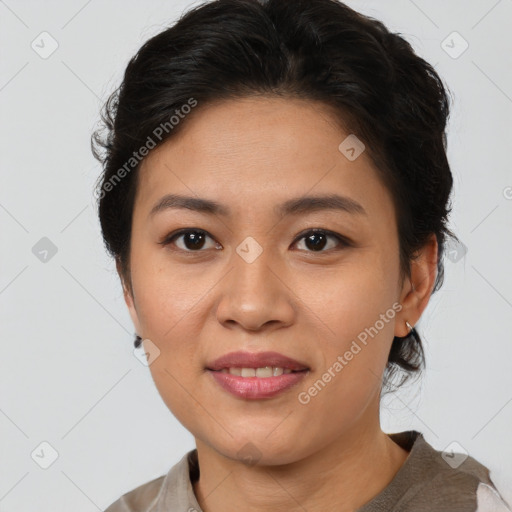 Joyful asian young-adult female with short  brown hair and brown eyes