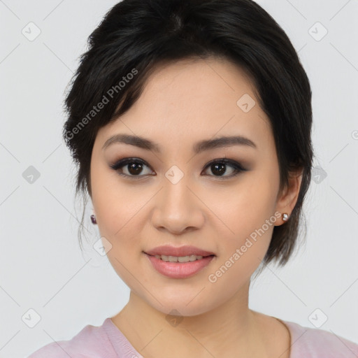 Joyful asian young-adult female with medium  black hair and brown eyes