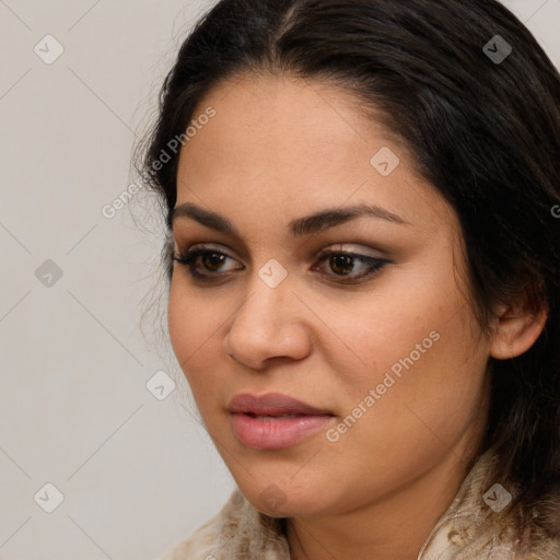 Joyful latino young-adult female with medium  brown hair and brown eyes