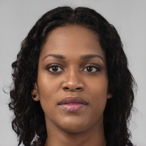 Neutral black young-adult female with long  black hair and brown eyes