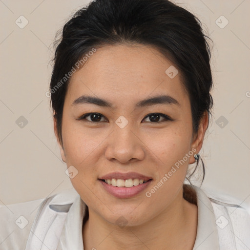 Joyful asian young-adult female with medium  brown hair and brown eyes